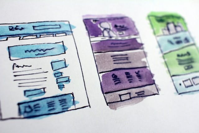 This is an image of colorful wireframes designing a website on a white background.